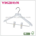 Plastic coat hanger with clips